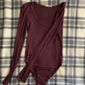 Long sleeve body suit.